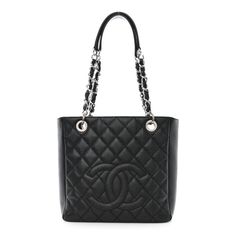 This is an authentic CHANEL Caviar Quilted Petit Shopping Tote PST in Black. This stylish tote is crafted of diamond quilted caviar leather in black. This shoulder bagfeatures a rear patch pocket, large Chanel CC on the face, andpolished silver chain link shoulder strapsthreaded with leather and a shoulder pad. The top opens to a spacious gray fabric interior with zipper and patch pockets. Classic Black Bag With Diamond Quilting, Luxury Black Shoulder Bag With Diamond Quilting, Black Diamond Quilted Bag For Everyday Luxury, Black Diamond Quilted Luxury Bag, Luxury Shoulder Bag With Diamond Quilting For Everyday, Luxury Evening Bag With Diamond Quilting, Luxury Diamond Quilted Evening Bag, Black Bags With Diamond Quilting For Evening, Black Evening Bags With Diamond Quilting