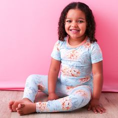 Get ready for a cozy good night's sleep with our Dahlia Pajamas! Made with ultra-soft bamboo fabric for maximum comfort, these short-sleeve pajamas feature a playful dahlia and blush pink bouquet print. Bring some springtime vibes to bedtime with our fresh and fun pajamas! 93% Bamboo; 7% Spandex Wash cold with like colors; stays soft wash after wash Fits snug; not treated with flame retardants Blush Pink Bouquet, Fun Pajamas, Toddler Pajamas, Best Pajamas, Long Romper, Pink Bouquet, Bamboo Fabric, Romper Dress, Short Rompers