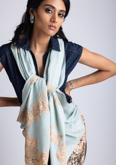 Woven from a fine cashmere, this azure scarf features an exotic dual shade beige - copper chantilly lace application extending at the ends of the scarf. A unique and stunning evening wear accessory to elevate the look of any outfit. Elegant Pashmina Shawl With Traditional Drape, Elegant Pashmina Shawl In Traditional Drape, Elegant Pashmina Dupatta Style Scarf, Elegant Dupatta Scarf, Elegant Pashmina Scarf In Traditional Drape, Elegant Pashmina Scarves In Traditional Drape, Luxury Pashmina Shawl Scarf, Elegant Blue Pashmina Shawl, Elegant Blue Pashmina Shawl For Festivals