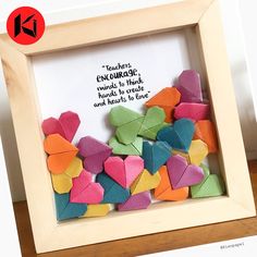 an origami photo frame with a quote on it