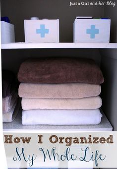 towels stacked on top of each other with the words how i organized my whole life