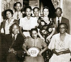 an old black and white photo of a group of people