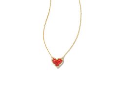 Kendra Scott Ari Heart Short Pendant Necklace - Necklace : Gold Red Kyocera Opal : Manifest love in the Kendra Scott Ari Heart Short Pendant Necklace. Subtle necklaces features stone centers with etched edges. 14K gold, 14K rose gold, rhodium - all plated over brass. Lobster claw closure with extender. Imported. Measurements: Chain Circumference: 14 in Adjuster Length: 2 1 2 in Pendant Height: 1 2 in Pendant Width: 9 16 in Weight: 0.01 oz Kendra Scott Red Necklace, Kendra Scott Heart Necklace, Bama Gameday, Short Pendant Necklace, Red Heart Necklace, Manifest Love, Kendra Scott Necklace, Pendant Necklace Gold, Red Necklace