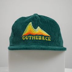 This Maxed-Out Mountain is a multi color embroidery with a curable brim  Embroidered Outheback logo Adjustable Snapback  100% corduroy cotton One size fits most Flat brimmed and curve-able brim PRINTED/EMBROIDERED IN THE U.S.A. Winter Cotton Snapback Hat With Curved Brim, Flat Bill Corduroy Hats For Winter, Corduroy Flat Bill Hat For Winter, Casual Corduroy Hats For Outdoor, Casual Corduroy Hat With Embroidered Logo, Corduroy Flat Bill Hat, Corduroy Baseball Cap With Flat Bill For Outdoor, Corduroy Flat Bill Baseball Cap For Outdoor, Retro Corduroy Flat Bill Hat