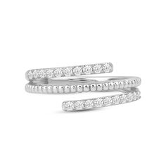 two white gold rings with diamonds on each side and one diamond set in the middle