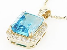 3.53ct Rectangular Octagonal Swiss Blue Topaz With 0.41ctw Round White Topaz 10k Yellow Gold Pendant With 18" Singapore Chain. Measures Approximately 0.84"L x 0.44"W And 2.5mm Bail. Lobster Claw Clasp. Luxury Topaz Necklace, Luxury Diamond-cut Blue Topaz Necklace, Pendant With Chain, Swiss Blue Topaz, Yellow Gold Pendants, White Topaz, Spring Rings, Lobster Claw, Gold Pendant