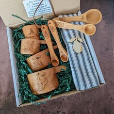 wooden spoons and measuring spoons in a box