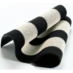 two black and white striped socks laying on top of each other