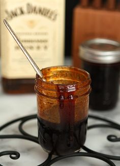 a jar filled with liquid sitting on top of a table