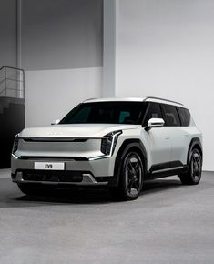 the new citroen suv is shown in front of a white wall and stairs