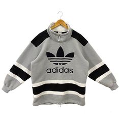 Vintage Adidas Fleece Sweater Adidas Mockneck Sweatshirt - Etsy Sporty Half-zip Sweater For Streetwear, Winter Sports Tops With Embroidered Logo, Winter Track Jacket With Embroidered Logo, Varsity Crew Neck Track Jacket For Winter, Varsity Track Jacket With Crew Neck For Winter, Winter Varsity Top With Ribbed Collar, Sporty Turtleneck Sweatshirt With Ribbed Collar, Vintage Embroidered Logo Tops For Winter, Winter Sportswear Top With Ribbed Collar