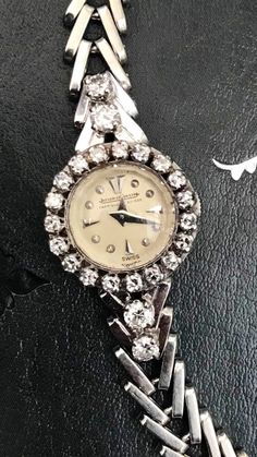 "Highest quality antique/ vintage Luxury of all time  ⚜️🔱⚜️🔱⚜️🔱⚜️🔱⚜️ Jaeger-LeCoultre 18K gold diamonds bracelets watch ⚜️Winds and sets well , timekeeping Good.  🧸Oiled & Serviced !  ⚜️18K solid gold case and bracelets (hall marked)  🧸23pcs VVS , D Color , Genuine Diamonds  ⚜️Signed Movement, dial , case , buckle, box  🧸100% original antique  ⚜️Cosmetic condition: Top- 95%new (minty )  🧸 perfect Dail ,  ⚜️ comes with Jaeger-LeCoultre it's original box  JAEGER LECOULTRE 18K solid gold and Diamond Wristwatch the round silvered dial with applied abstract numeral indicators; framed by a full-cut diamond bezel; completed with a 18K solid gold bracelet Extremely RARE! _ Full set 《Collection grade》True Anquite to be collected  Case size 20-22mm including winding button. 🍀Note: For the n Wedding Diamond Watch With Jubilee Bracelet, Antique Diamond Watch For Evening, Antique Diamond Jewelry And Watches, Vintage Formal Watches With Brilliant Cut, Vintage Diamond Watch With Diamond Hour Markers For Evening, Vintage Diamond Watch For Evening, Vintage Evening Diamond Watch With Accents, Vintage Watches With Diamond Hour Markers In Diamond White, Vintage Watches With Diamond White Color And Hour Markers