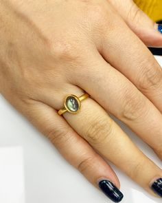 Natural Labradorite Ring * Dainty Cabachon Ring * Genuine Labradorite & 14K Solid Gold * Best Gift for Her/Him * Handmade Ring ◎ Details ◎ ○ Gemstone Details .Natural LABRADORITE Oval Cut 9X7 mm approx. 1.54 ct ○ Gold Details 14K Solid Gold Width of Band : 2.50 mm Weight of Ring : approx 3.80 gr Made to Order HANDMADE ITEM ○ Upgrade to Solid 18K Gold, please click the link below: https://www.etsy.com/listing/962826004 For more CABACHON BEZEL rings : http://etsy.me/37fvI60 All of our jeweller Gold Rings With Labradorite Gemstone, Gold Labradorite Gemstone Rings, Yellow Gold Labradorite Ring For Gift, Gold Labradorite Rings For Anniversary, Gold Oval Cabochon Birthstone Ring, Gold Oval Emerald Ring For Everyday Wear, Elegant Gold Rings With Labradorite, Elegant Gold Labradorite Ring, Gold Oval Cabochon Birthstone Ring With Bezel Setting