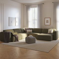 a living room with a large sectional couch