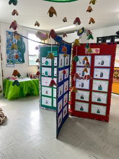 the room is decorated with colorful paper birds