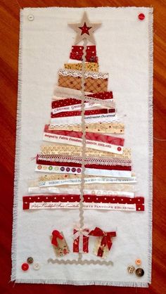 a christmas tree made out of strips of fabric