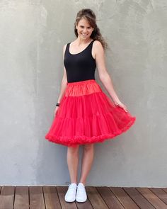 FREE SHIPPING ON ORDERS OVER $100Due to high demand please allow 3-4 weeks for shipping! This gorgeous petticoat is so soft, comfortable and adds amazing volume to any gig outfit, costume or rock and roll dress. Pair this with any of our dresses to elevate your outfit to the next level and give you that WOW factor you deserve. Features 3 layer petticoat with 2 super soft high volume tulle layers with ruffled edges and 1 silky inner layer for comfort. Elastic waistband to fit a variety of sizes: Rock And Roll Dress, Rock And Roll Dresses, Gig Outfit, Roll Dress, Outfit Costume, Balloon Twisting, White Balloons, Long Red, Wow Factor