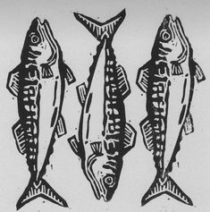 three fish that are standing next to each other on a white surface with black ink