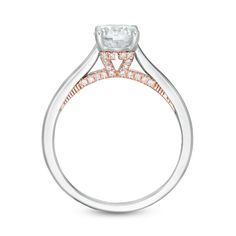 a white and rose gold engagement ring with diamonds