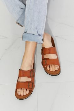 These double-banded slide sandals give a luxe look with their faux leather upper and cork sole. Their comfy design is perfect for wearing for almost any summer adventure. Size fit: True to size Pattern type: Solid Type: Slides Toe: Open toe Heel height: Flats Heel shape: Flats Material: PU leather /Cork sole Imported Product measurements: Heel height: 1 inchLuis Shophas made a name for itself in European and Asian markets through footwear trade shows. In 2021. Luis Shopstarted its journey to the US market. All products are crafted with high-quality materials and designs that have been well-received in European and Asian markets. Luis Shopaims to provide fashionable and high-quality shoes at an affordable price to customers around the world.Upgrade your footwear game with Luis Shopand exper Casual Toe Loop Footbed Sandals For Summer, Casual Summer Footbed Sandals With Toe Loop, Brown Cork Slides With Round Toe, Double Strap Cushioned Footbed Sandals For Vacation, Casual Double Strap Footbed Sandals For Vacation, Cushioned Double Strap Footbed Sandals For Vacation, Vacation Leather Footbed Sandals With Flat Heel, Leather Footbed Sandals With Flat Heel For Vacation, Casual Toe Loop Flip Flops With Buckle Closure