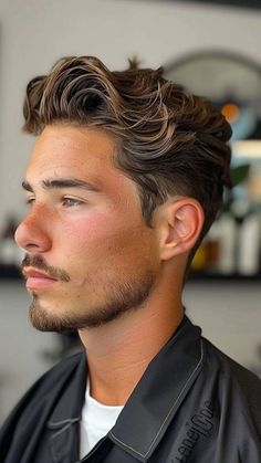 The Slicked Back Waves
For a more polished look, this style slicks back the wavy hair into a clean, sleek form. A bit of product is used to tame the waves, creating a controlled and sophisticated appearance. Ideal for formal settings where you still want to highlight natural texture.
#MensStyle #ModernGentleman #Hair #Hairstyle #Haircut #MensGrooming #hairstylesforthinhair #buzzcut #messyfringe #haircuttingstyle #sassyhairolder #buzzcutmasculino #WavyStyle Long Wavy Perm Men, Slicked Back Wavy Hair Men, Men’s Wedding Hairstyles, Textured Slick Back Men, Wavy Slick Back Men, Wavy Hair Styles Men, Mens Classic Hairstyles, Medium Hair Styles For Men