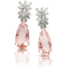 Indulge in the luxurious beauty of these 18k white gold Ghirlanda Atelier Earrings by Pasquale Bruni. The exquisite design features a stunning morganite stone that shimmers with a subtle pink hue, surrounded by brilliant white and grey diamonds. The unique color combination of these gems creates a mesmerizing contrast that will captivate any onlooker. The earrings are masterfully crafted with intricate details, making them an exceptional addition to any fine jewelry collection. These earrings wi Luxury Fusion Jewelry With Natural Stones, Luxury Elegant Gemstone Earrings, Luxury Silver Jewelry With Stone Work, Formal Briolette Diamond Cut Earrings, Formal Briolette Diamond Accented Earrings, Formal Briolette Earrings With Diamond Accents, Formal White Gold Pear-shaped Earrings, Formal Pear-shaped White Gold Earrings, Briolette Diamond Accent Earrings For Formal Occasions