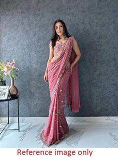 Georgette saree with blouse, Pink saree for women, wedding saree for function, sequence saree for evening wear, designer saree for function Saree Details:  Saree Color: Pink  Saree Fabric:  Faux Georgette Saree Work: Fancy  Thread Work  With  Sequence Work Saree Length:5.5 Meter Blouse Details : (UN-Stitched) Blouse Color: Matching. Blouse Length: 0.8meter Blouse Fabric:  Heavy Mono banglory Blouse Work:All Over Thread With  Sequence Work Blouse wear by model is just for modeling purpose only, a Party Wear Pre-draped Saree With Zari Work For Diwali, Wedding Saree With Semi-stitched Blouse, Party Wear Pre-draped Saree With Unstitched Blouse, Elegant Semi-stitched Saree For Navratri, Party Wear Pre-draped Saree With Cutdana, Dola Silk Saree With Sheer Dupatta, Traditional Evening Saree In Chinon, Diwali Party Wear Georgette Pre-draped Saree, Semi-stitched Georgette Pre-draped Saree With Self Design