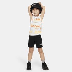 This 2-piece set is our take on the classic PE uniform. The graphic tank is made of smooth cotton jersey with lots of Swoosh love on display. The matching French Terry shorts are lightweight with a stretch waistband for comfy wear kiddos can run, jump, crawl and play in. Nike Cotton Summer Activewear, Nike Cotton Activewear For Summer, Nike Summer Activewear, Casual Training Tops With Logo Print, Playful Nike Tops For Sports, Casual Activewear For Training With Logo Print, Casual Activewear With Logo Print For Training, Casual Tank Top With Letter Print For Training, Casual Cotton Tops For Training