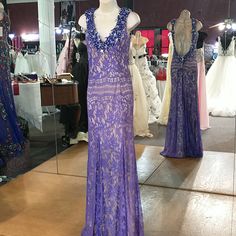 Lace Overlay Jewels On Neckline Royal Over Nude Looks Purple Purple V-neck Prom Gown, Purple Sleeveless Gown For Gala, Purple Floor-length Gown For Prom, Purple Evening Dress With Sweep Train, Purple V-neck Evening Dress, Purple Maxi Length Evening Dress For Gala, Purple Maxi Gown For Prom, Purple Maxi Evening Dress For Gala, Purple V-neck Gown For Gala