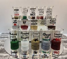 there are many glasses with different types of glitters on the bottom and one is empty