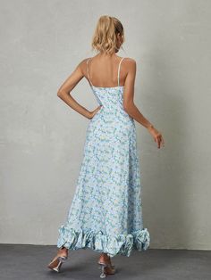 The Ilsa Spaghetti Floral Maxi Dress in Blue is a breathtaking display of beauty and charm. With its delicate spaghetti straps and vibrant floral pattern, it exudes a sense of feminine grace and elegance. The flowing maxi length adds an ethereal touch, making it an ideal choice for special occasions or summer soirées where effortless glamour is desired. Material: 100% Polyester Invisible zipper opening at the back Stretch Factor: Non Stretch Clean: Gentle machine wash Color may vary due to the l Blue Sundress With Adjustable Straps For Garden Party, Blue Fitted Maxi Dress With Ruffled Straps, Light Blue Spring Dress With Adjustable Straps, Light Blue Fitted Maxi Dress With Spaghetti Straps, Blue Maxi Dress With Ruffled Straps For Vacation, Blue Chiffon Maxi Dress With Spaghetti Straps, Fitted Maxi Dress With Delicate Straps, Flowy Floral Print Maxi Dress With Ruffled Straps, Light Blue Maxi Sundress For Spring