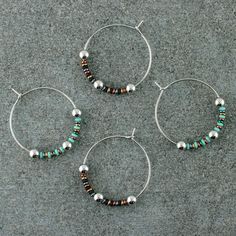 Small, beaded hoop earrings. ‣ handmade and polished, small earring hoops (316L stainless steel) ‣ tiny (2mm), Japanese glass seed beads ‣ shiny, 4 mm stainless steel beads * SIZE:  Approx hoop Ø: 2.3 cm / .9"  Beads: 2-4 mm * COLORS (Choose from the drop-down menu): ‣ BLUE - 1 pair ‣ BLACK - 1 pair ‣ BOTH - 2 pairs as SET (one pair of BLUE and one pair of BLACK hoops as a set, on a double earring card) Click here for more beaded hoop earrings: www.etsy.com/shop/LianuDesign?ref=seller-platform-m Gift Dangle Hoop Earrings With Spacer Beads, Hoop Earrings With Spacer Beads As Gift, Hoop Earrings With Spacer Beads For Gifts, Round Hoop Earrings With Spacer Beads For Gift, Spacer Beads Small Hoop Jewelry For Gift, Small Hoop Spacer Beads Jewelry As Gift, Small Hoop Spacer Beads Jewelry For Gift, Minimalist Small Hoop Beaded Earrings Nickel Free, Silver Hoop Earrings With Tiny Beads