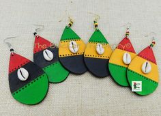 The handmade, hand painted and TBTB designed earrings are 3 inches long. There are three selections the RBG which are the red, black and green. The Jamaica flag colors which are the green, yellow and black.. The Rasta earrings are red, yellow and green. These are lightweight and coated for protection. They are black on the back. If you have any questions about this piece please feel free to contact us at anytime. Our products are not intended for babies or children as we use small pieces, wires Jamaica Women, Rasta Earrings, African Christmas, Teardrop Jewelry, Jamaica Flag, African Accessories, Loc Jewelry, African Earrings, African Necklace