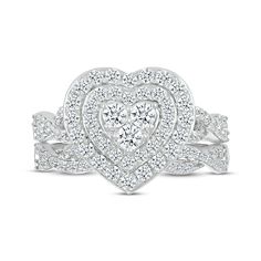 a heart shaped diamond ring with two rows of diamonds on the band and one row of round