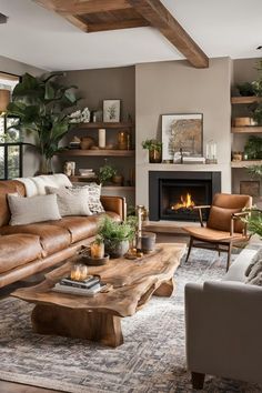 a living room filled with furniture and a fire place in the middle of the room