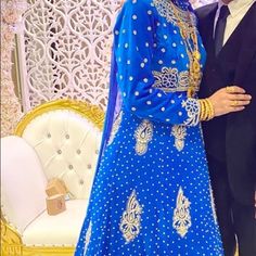 Beautiful Handmade Bridal Dress! Very Heavily Designed With Beautiful Crystals That Glitter All Over! On Royal Blue Velvet Fabric. Made To Fit Size Medium 6-8. Height Is 5”5 Wore 3 Inch Heels. Worn Once. Originally $3,000. Stone Work Gown For Eid Reception, Eid Reception Gown With Stone Work, Anarkali Gown With Stone Work Floor-length, Bollywood Gown With Stone Work For Eid, Traditional Eid Gown With Stone Work, Blue Choli With Dabka Work For Wedding, Blue Zari Work Dress For Wedding, Blue Dress With Zari Work For Wedding, Royal Blue Dabka Traditional Wear For Wedding