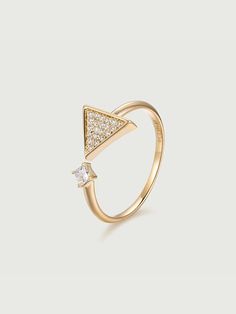 Diamond For Wedding With its striking geometric design and sustainable craftsmanship, the 14K Solid Gold Triangle Tiled Lab Diamond Ring is a statement piece that celebrates both style and ethics. Whether worn as a fashion statement or a symbol of individuality, this ring is sure to dazzle and delight. Details Material: 14K Solid Gold Gemstone: Lab Diamond Clarify: VVS SI DEF Color Total Carat Weight: 0.3ct Band Width: 2.5mm Size: US 6.5 Triangle Diamond Ring, Triangle Tiles, Triangle Diamond, Gold Triangle, Triangle Ring, Luxury Jewelry Brands, Cvd Diamond, Mineral Stone, Ring Pendant Necklace