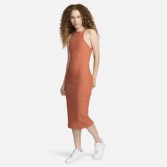 Grounded in style, comfort and versatility, meet our take on luxury loungewear. Our ribbed jersey is super soft and opaque, elevating your look with texture you can feel. A body-skimming fit makes this midi dress perfect for those low-key days when you want to feel chill but still put together. Sleeveless Fitted Bodycon Loungewear Dress, Fitted Sleeveless Bodycon Dress For Loungewear, Sleeveless Sleek Seamless Bodycon Dress, Sleek Sleeveless Seamless Bodycon Dress, Casual Nike Sleeveless Dress, Nike Casual Sleeveless Dress, Solid Stretch Midi Dress For Loungewear, Spring Sleeveless Bodycon Loungewear Dress, Solid Sleeveless Midi Dress For Loungewear