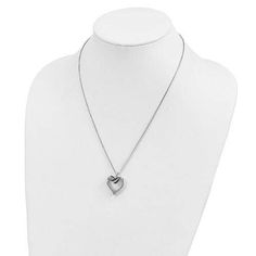 Dazzle and glam up your daily outfit by wearing a Sterling Silver Rhod Plated Black And White Diamond Pendant Necklace. This themed-necklace is plated with Rhodium primarily made up of Sterling Silver and with a Diamond heart-shaped pendant that would complete your glam up look in any ordinary or extraordinary day. You can also buy this one as a gift for a special woman in your life. Product Specification Chain Length 18 In Chain Width 1 Mm Clasp /Connector Spring Ring Feature Solid Item Weight White Gold Heart Pendant Jewelry With Box Chain, Elegant Heart Jewelry With Oxidized Finish, Elegant Heart-shaped Jewelry With Oxidized Finish, Elegant Heart-shaped Oxidized Jewelry, Sterling Silver Polished Heart Pendant Necklace, Sterling Silver Heart Pendant Necklace With Polished Finish, Heart Shaped Sterling Silver Necklace With Oxidized Finish, Heart-shaped Oxidized Sterling Silver Necklaces, Heart-shaped Sterling Silver Necklace With Oxidized Finish