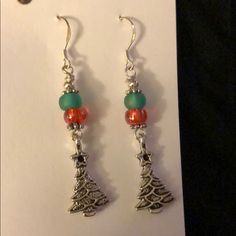 Christmas Tree Earrings. Never Worn. Still On Card. Sterling Silver Earwires. 2 Inches Long. Adorable. Christmas Dangling Bead Earrings, Christmas Dangle Beaded Earrings With Colorful Beads, Christmas Beaded Dangle Earrings With Ear Wire, Little Debbie Christmas Tree Earrings, Christmas Jewelry: Dangling Bead Drop Earrings, Christmas Earrings, Christmas Jewelry