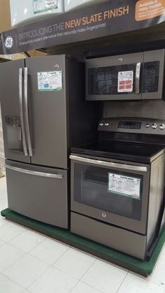 two new stainless steel appliances are on display