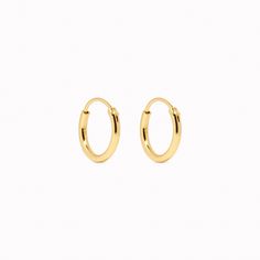 Our small gold hoop earrings are dainty and classic, making them perfect for everyday wear. Hoops measure at 12mm Gold Hoop Earrings Mini, Gold Earring Hoops, Small Gold Hoops Earrings, Gold Mini Hoop Earrings, Small Hoops Earrings, Gold Earing, Small Gold Earrings, Real Gold Earrings, Hoop Gold Earrings