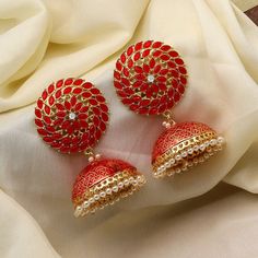 Beautiful big jhumka meenakri earrings. These are statement earrings. Care Instruction: Avoid Heat & Chemicals Like Perfume, Alcohol, Etc. | Clean With Dry Cotton Cloth Red Cutdana Earrings For Navratri, Heavy Red Jhumkas For Festivals, Heavy Red Jhumkas For Festive Season, Red Cutdana Jhumkas For Diwali, Heavy Red Chandbalis For Navratri, Red Meenakari Chandbalis, Festive Heavy Red Jhumkas, Red Bollywood Style Chandbalis For Navratri, Red Bollywood Chandbalis For Eid