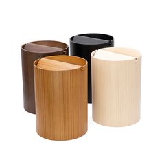 three different types of trash cans on a white background, one is black, the other is brown