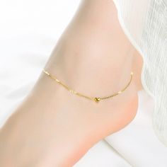 18K Solid Gold Bracelet Solid Gold Anklet With Heart Charm Personalised Gift for Women Gift for Her Handmade Jewellery 18K Solid Gold ♡ More for less. This is a minimalist and elegant anklet made of 18K solid gold. With a heart charm, it carries full of love. We offer free personalised service for this item. Add a personal touch for personalised gift. Perfect gift for her or self-gifting.  * Materials: 18K Solid Gold * Dimensions:  Bracelet Adjustable Length16-18cm, Anklet Adjustable Length 22~24cm, Chain Thickness 1-1.3mm ♡ The item is a perfect gift for different occasions and purposes, such as a Birthday gift, Anniversary gift, Valentine's Day gift, bridesmaid gift, Mother's Day gift, Girlfriend gift, Graduation Gift, Gift for Daughter, and any other. ♡ In case you need any further info Elegant Heart-shaped Anklets For Wedding, Elegant Wedding Anklets For Valentine's Day, Elegant Wedding Anklets, Elegant Adjustable Anklets With Heart Charm, Elegant Heart Charm Anklets For Valentine's Day, Elegant Heart-shaped Anklets For Valentine's Day, Dainty Anklets With Heart Charm For Gifts, Gold Heart Anklets, Dainty Anklet With Heart Charm As Gift