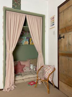 an instagram photo of a child's room with curtains and a bed in the corner