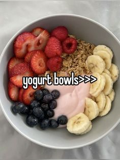 yogurt bowl with bananas, strawberries and blueberries in it that says yogurt bowls