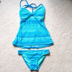 Hobie Brand Swimsuit, 2 Piece Halter Tankini With Bikini Bottoms, Crochet Blue Ocean Colors, Both Are Small Excellent Condition, Never Worn, Smoke-Free Home, Free From Rips, Tears, And Stains Blue Sleeveless Tankini For Beach, Sleeveless Blue Tankini For Beach, Sleeveless Turquoise Tankini For Pool, Blue Halter Neck Tankini With Lined Body, Turquoise Stretch Tankini For Vacation, Blue Sleeveless Tankini For Beach Party, Turquoise Sleeveless Tankini For Swimming, Blue Halter Neck Swim Dress For Beach, Blue Summer Tankini For Poolside