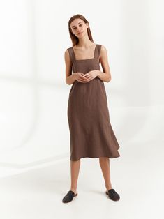 "ELLIDY is a simple strap linen dress with belt. DETAILS - Sleeveless design - Spaghetti straps - Self-tie belt - 100% lightweight European linen fabric - Cut and sewn to order just for you in our studio COLOR - Cocoa, you can also choose other colors above - Fabric samples are available here https://www.etsy.com/listing/586569696/linen-fabric-samples SIZING & FIT - True to size - Model is 5'8.9\" / 175cm and wearing a size S CARE FOR LINEN - Machine wash up to 30ºC/86ºF gentle cycle - Lay f Casual Linen Dress With Adjustable Straps For Brunch, Chic Linen Sundress With Adjustable Straps, Linen Sundress With Adjustable Straps, Sleeveless, Casual Linen Dress With Adjustable Straps For Daywear, Chic Linen Midi Dress With Tie Straps, Sleeveless Linen Dress With Adjustable Straps For Brunch, Sleeveless Linen Dress With Adjustable Straps, Brown Summer Dress With Adjustable Straps, Linen Square Neck Dress With Adjustable Straps