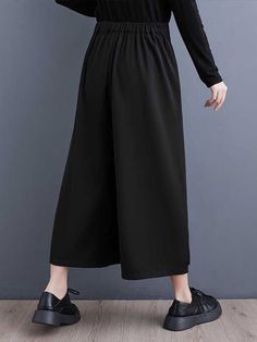 Sku CY-!163302 Material < 30% Polyester , >70%Cotton Style Loose , False Two , Wide Leg , High Waisted Feature Tied Waist , Asymmetric , Elasticity , Solid Color Occasion Casual , Simple , Leisure Fashion Seasons Spring , Summer , Autumn Type Ninth Pants , Culotte Color BLACK Size One_size Please consult the size chart we provide for this item's measurements to help you decide which size to buy.Please note: There may be 1-3cm differ due to manual measurement.CMINCH Waist Hips Bottom Length Leg O Black Solid Color Bottoms For Spring, Casual Full-length Culottes, Casual Full Length Culottes, Black Plain Wide Leg Bottoms, Black Solid Color Bottoms For Fall, Black High Waist Bottoms, Black Wide-leg Pants With Tie Waist, Black Wide Leg Pants For Spring, Black Wide Leg Pants With Tie Waist